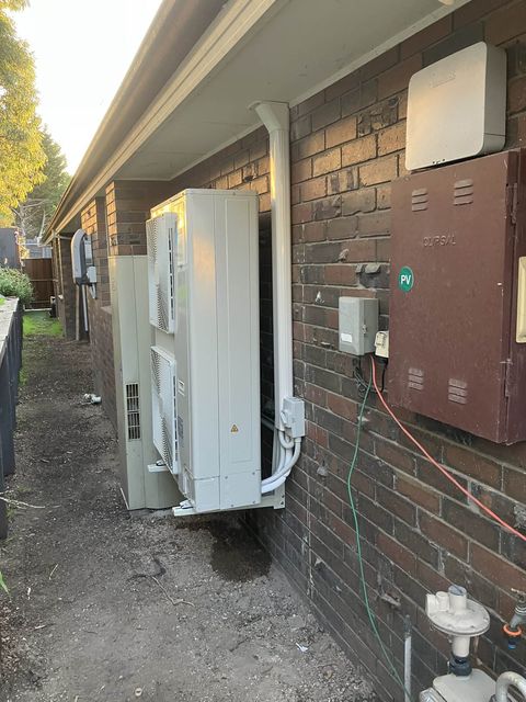 A slimline ducted outdoor unit in a side passage