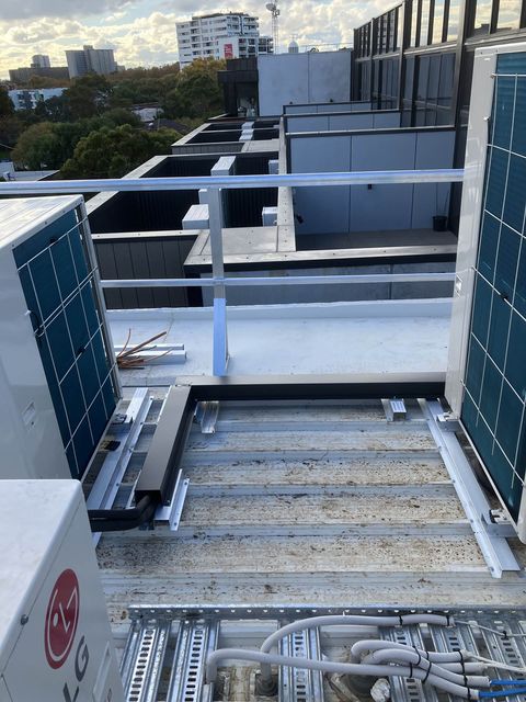 Commercial rooftop condensers and pipe runs